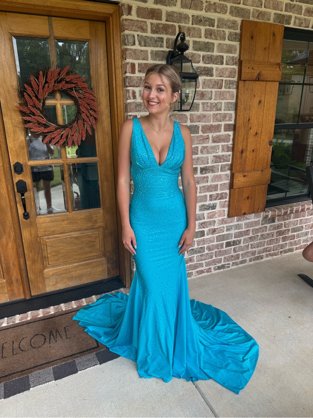 Johnathan Kayne Turquoise Beaded V‑Neck Prom Gown